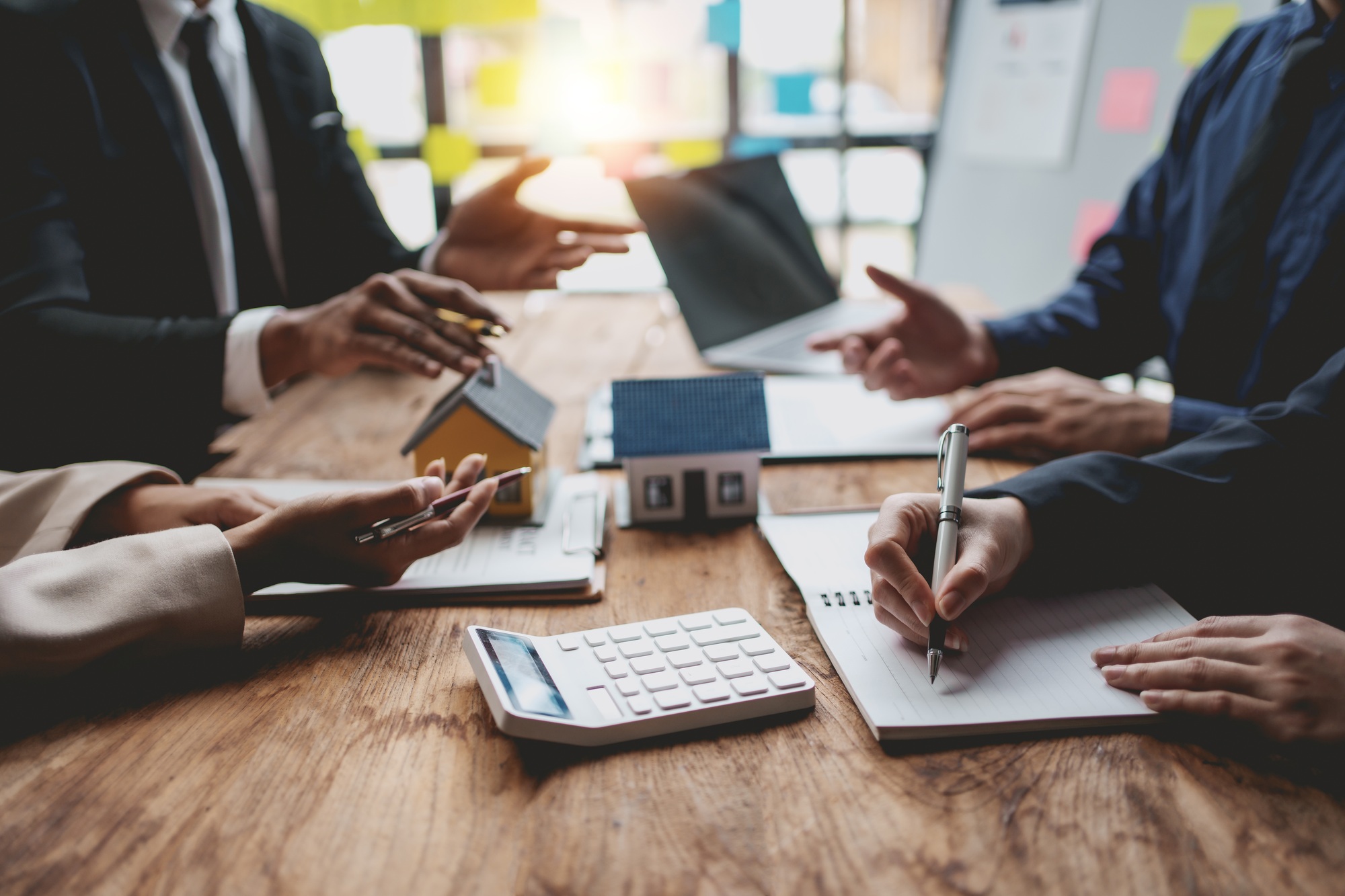 Business people meeting together about real estate. Working as a teamwork of real estate businesses.